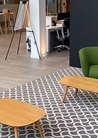 Modern Office Space With Green Sofa And Brown Leather Chairs Farnborough